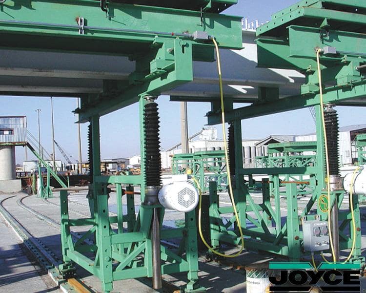 Assembled Joyce/Dayton actuators displaying various models and configurations for industrial use