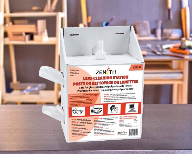 Zenith brand pre-moistened safety glasses wipes box on an industrial workstation, ideal for maintaining clear vision and protective eyewear.